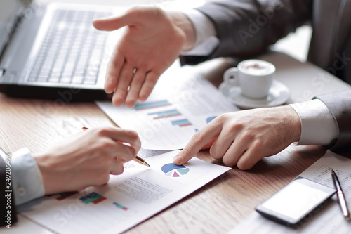 Obraz na płótnie business people and partners are analyzing sales figures this y w salonie