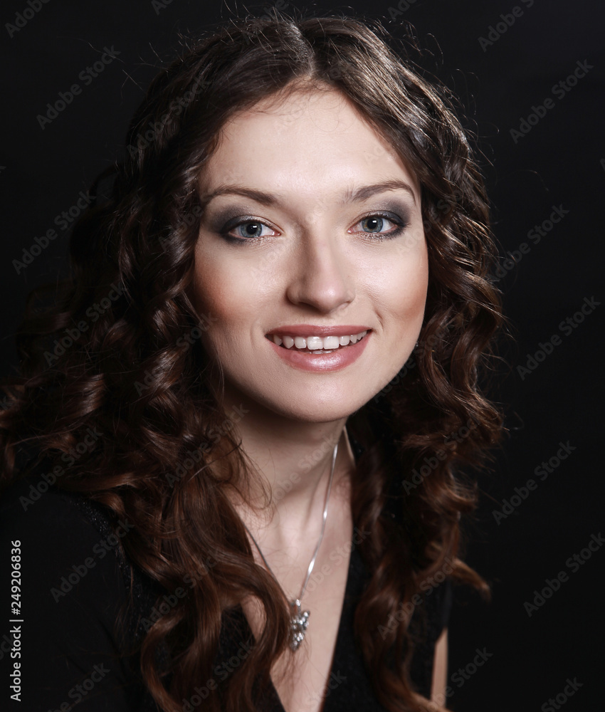 closeup of beautiful young woman in evening black dress closeup of beautiful young woman in evening black dress
