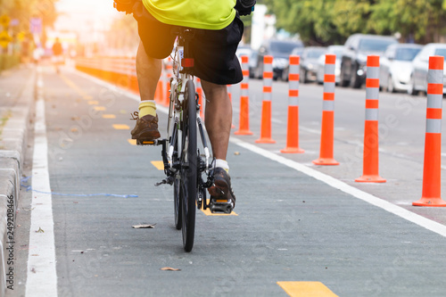 Wall Mural Man exercise bicycles in the bike lanes in the daytime.