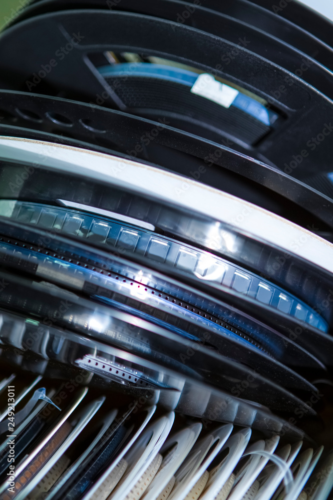 Microelectronic Components. Surface Mount Components On tape and Reel Package. Variety of Reels in One Stack Together. Microelectronic Components. Surface Mount Components On tape and Reel Package. Variety of Reels in One Stack Together.