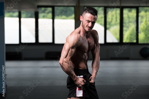 Man In Gym Showing His Well Trained Body