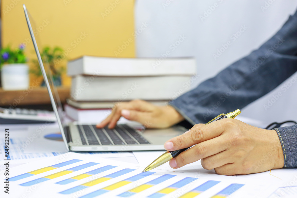 hand businesswomen are typing on computers to find current online trading trends. hand businesswomen are typing on computers to find current online trading trends.