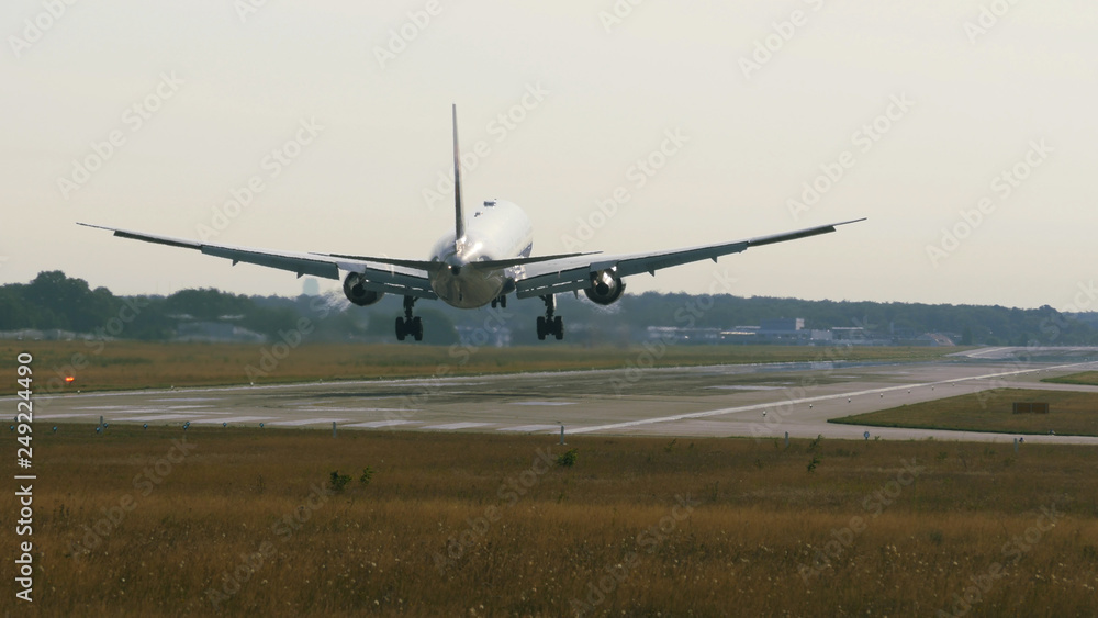 Widebody twin engine airplane arrive at the morning