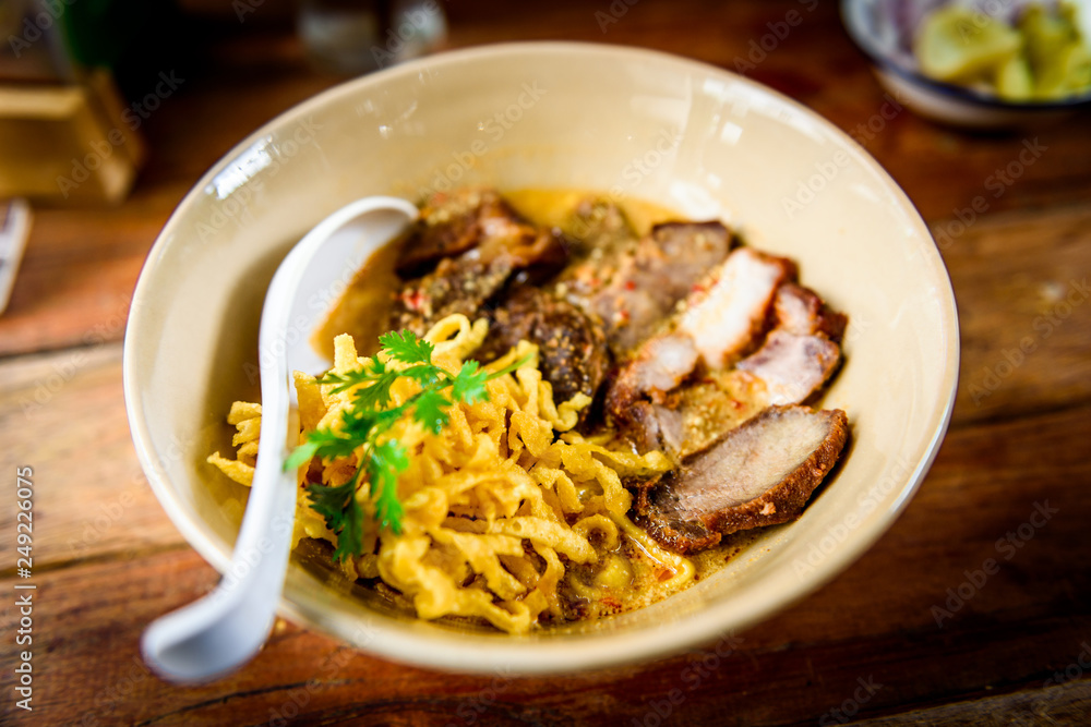 Khao soy. Traditional northern Thai food. Thai curry with noodle with meat. Khao soy. Traditional northern Thai food. Thai curry with noodle with meat.