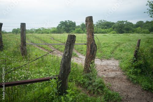 old wooden fence in a field