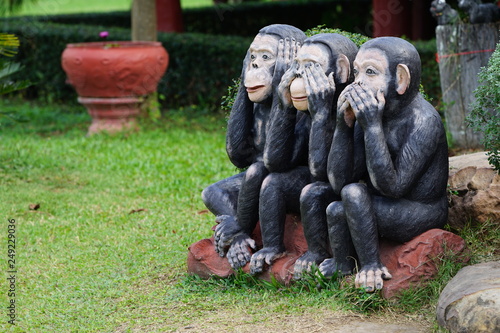 Canvas Print three black monkeys statue, closes eye, mouth, ear.