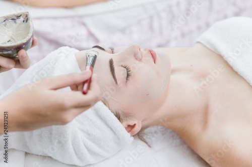 facial skin treatment with natural herbal in spa.