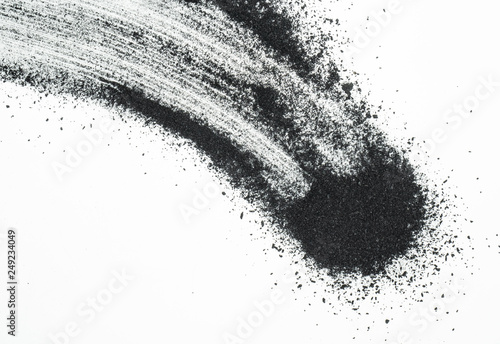 Billede på lærred Abstract picture of activated charcoals powder on white background