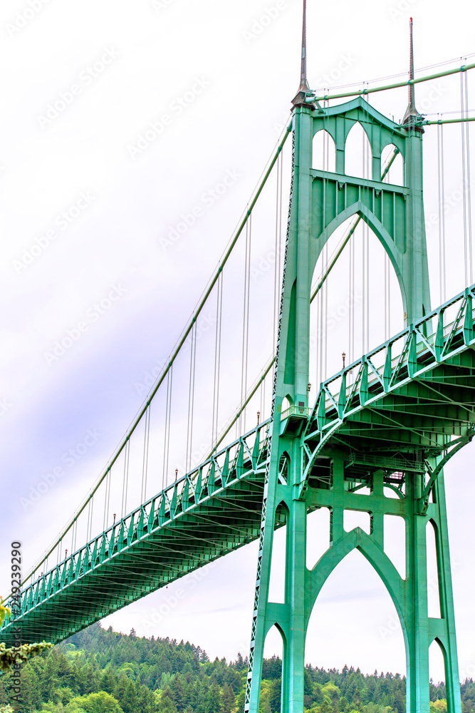 Fototapeta premium Famous arched gothic St Johns bridge across the Willamette River