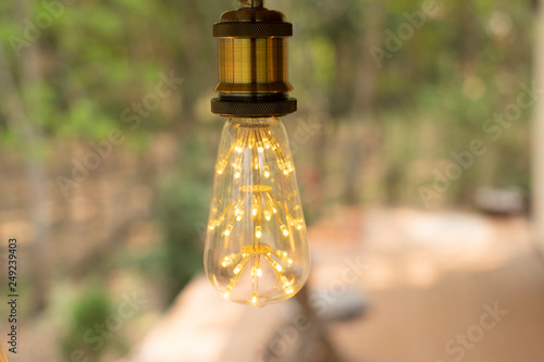 classic retro incandescent led electric lamp on blur background,Vintage light bulb photo