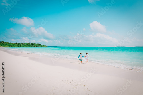 happy loving couple enjoy beach, family on tropical vacation