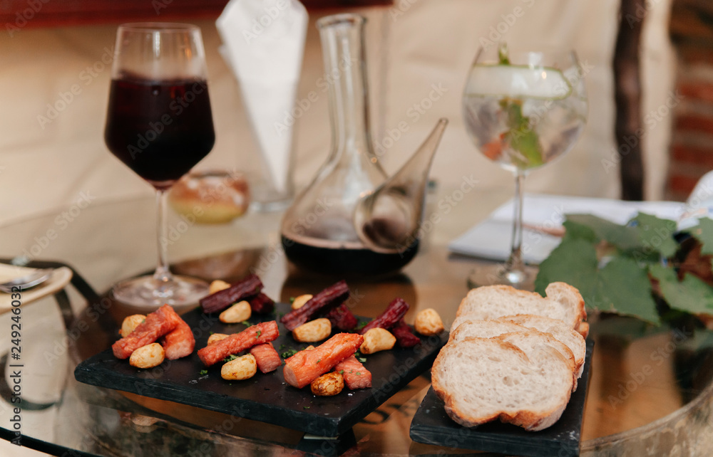 Baguette bread with dried beef jerky, appetizer canape close up shot