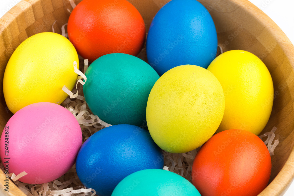 easter eggs in wooden bowl