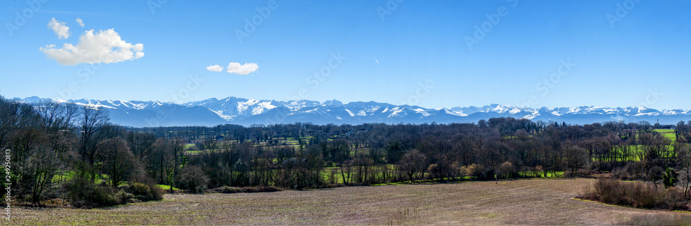 view of the countryside with the Pyrenees mountains in background view of the countryside with the Pyrenees mountains in background