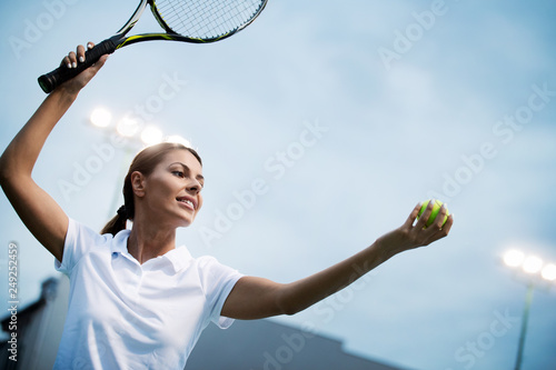 Happy fit girl playing tennis together. Sport concept © NDABCREATIVITY