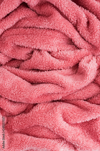 Close up top view of coral blanket wrinkled texture. Fluffy coral background.