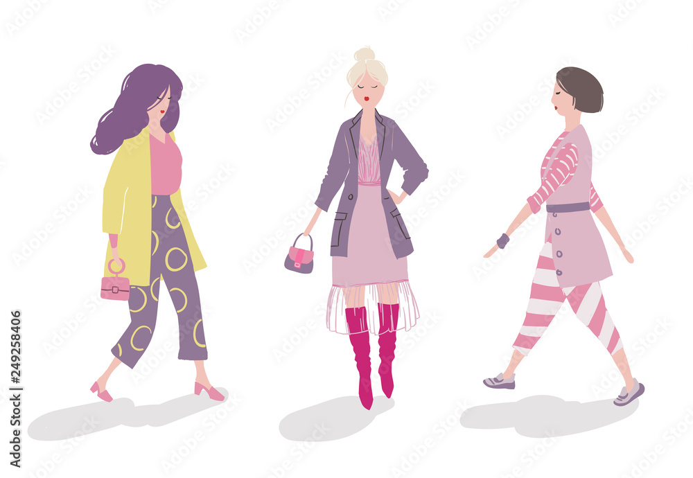 Group of fashionable girls walking and posing Group of fashionable girls walking and posing
