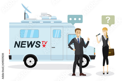 Beautiful female reporter with microphone interviews european businessman,