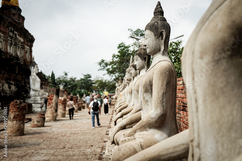 Old stone beautiful image buddha in temple asian history in Ayutthaya, Thailand 