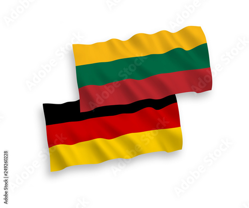 National Vector Fabric Wave Flags of Germany and Lithuania Isolated on White Background. 1 to 2 proportion.