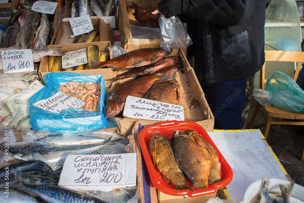 Sale of various fish at a fair in Russia. A counter with fish in the market