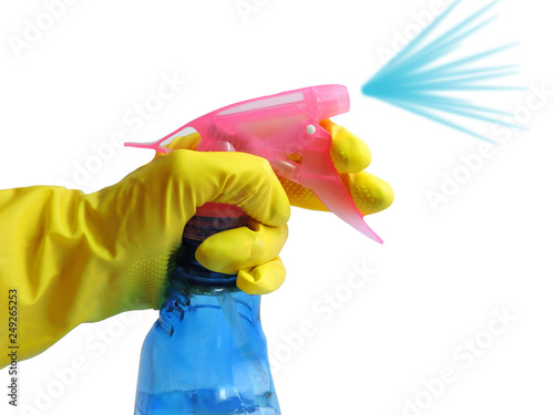 House Cleaning. Female hand in yellow glove cleaning .Hand in yellow glove with brush isolated on white background. Spring general or regular clean up. Commercial cleaning company. Copy space. 