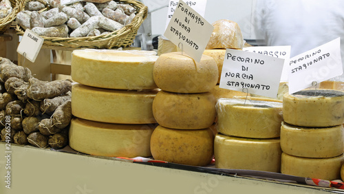 italian cheese with text PECORINO that means cheese made with mi photo