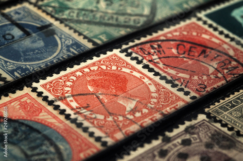 Postage stamps of the Netherlands and Belgium early twentieth century. Shallow depth of field