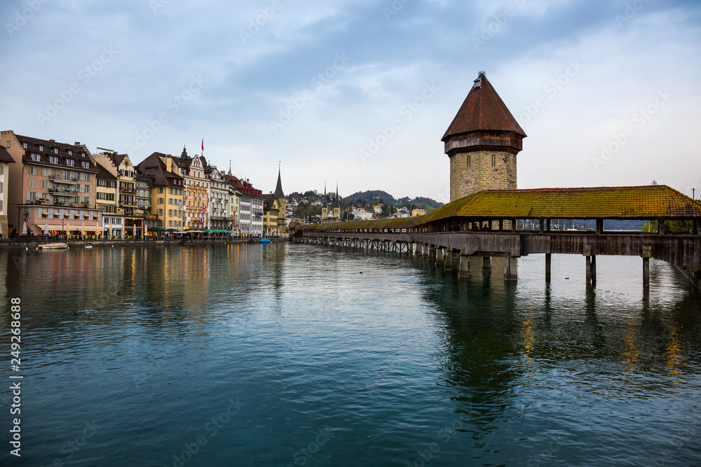 Chapel Bridge, wooden bridge with grand stone water tower - Luzern, Switzerland