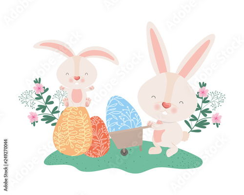 rabbits with wheelbarrow and easter eggs icon