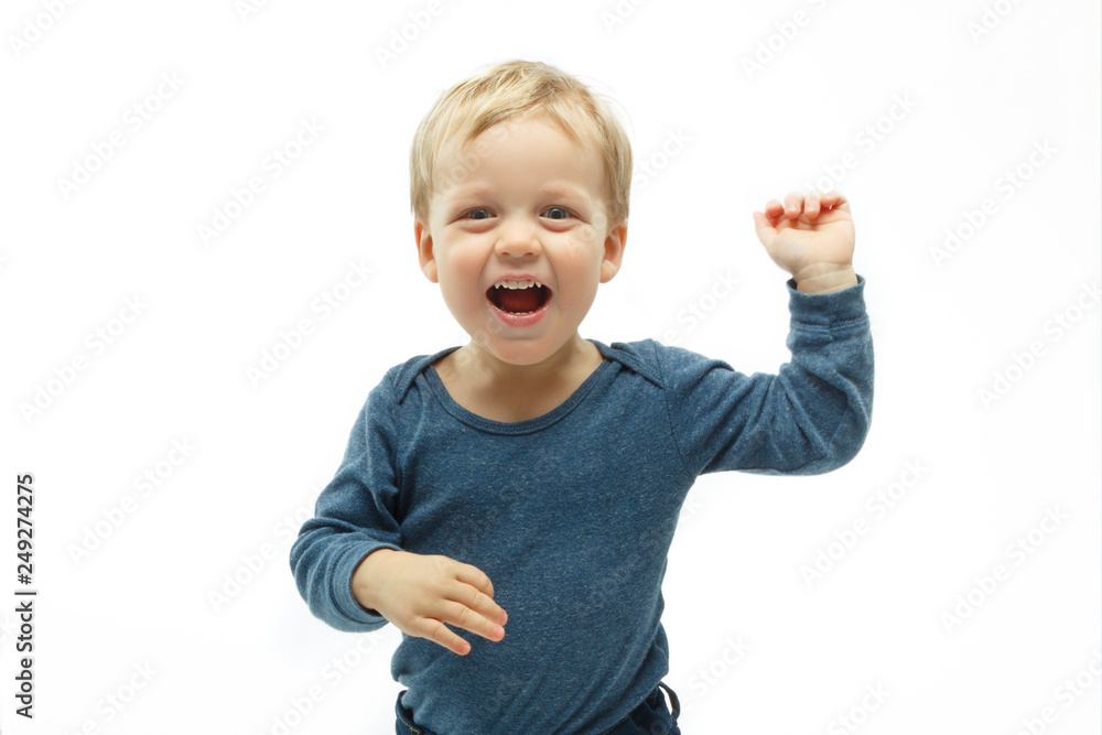 kid with funny expression gesture open hand fingers on white background. winning baby boy