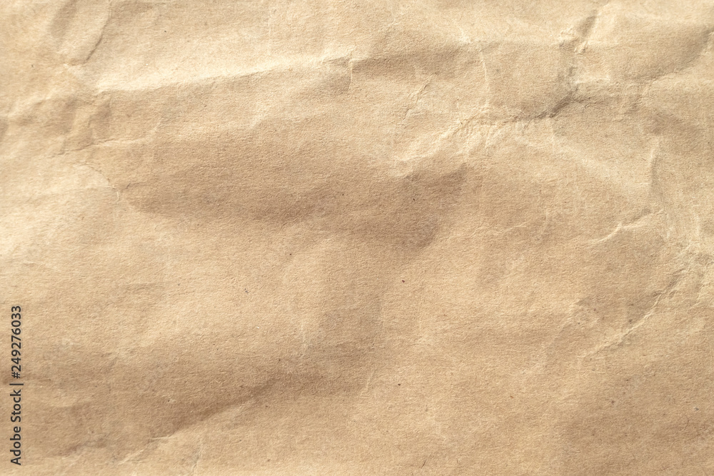 Brown crumpled paper texture background. Brown crumpled paper texture background.