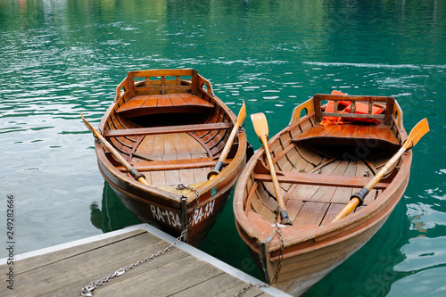 Two boats of wood at the lake