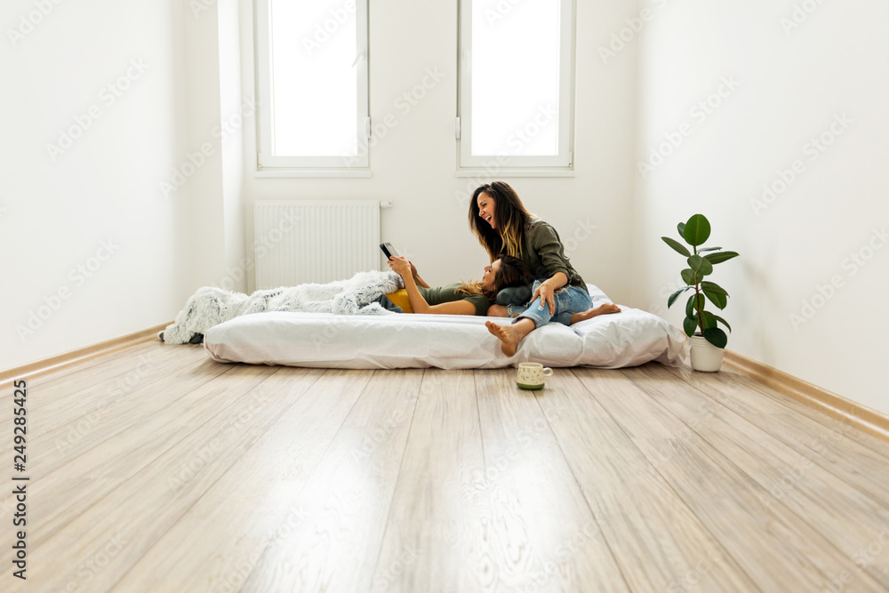 Lesbian couple moving into a new apartment Lesbian couple moving into a new apartment