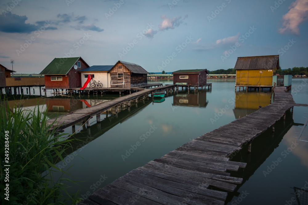 Wooden cottages on the Bokod lake in Hungary