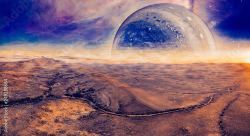 Fototapeta Naklejka Na Ścianę i Meble -  Alien fantasy panoramic landscape - unreal planet rising over desert. Elements of this image are furnished by NASA