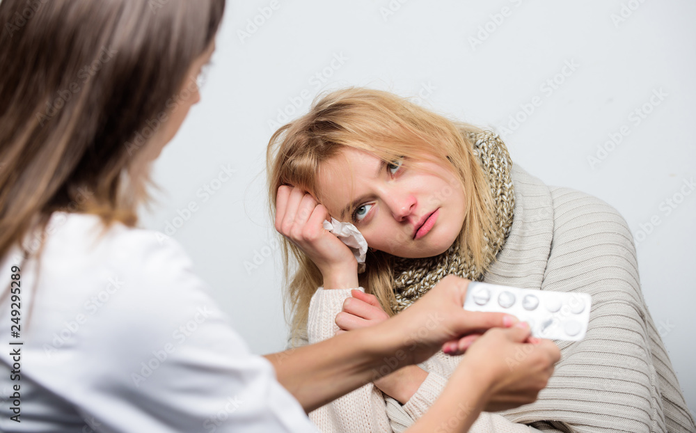Need a doctor. Medical doctor examining patient. Doctor visiting unhealthy woman at home. Primary care doctor making diagnosis to sick woman. Patient care and healthcare Need a doctor. Medical doctor examining patient. Doctor visiting unhealthy woman at home. Primary care doctor making diagnosis to sick woman. Patient care and healthcare
