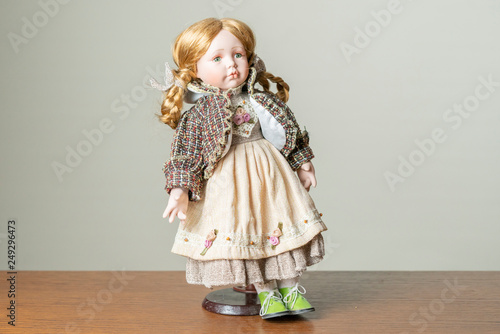 porcelain doll in an old dress