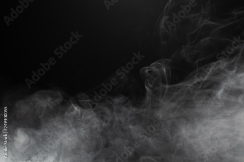 dense smoke on black background photo