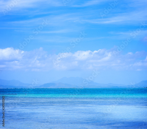 Wallpaper Mural Beautiful ocean scene view isolated with light blue sky background, concept of vacation and sea travel, copy space Torontodigital.ca