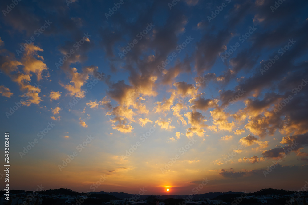 Beautiful and amazing nature sunset sky with clouds .