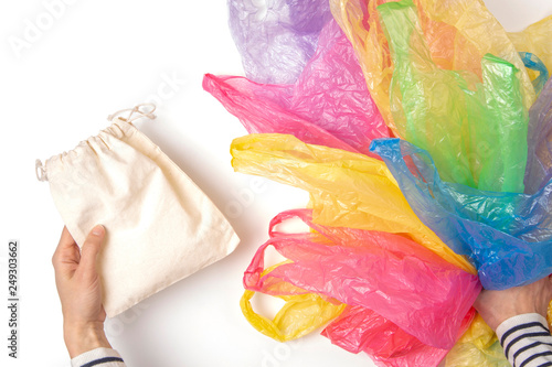 Wallpaper Mural Woman holding reusable shopping bag instead of many single use plastic bags. Say no to plastic, environmental, pollution concept Torontodigital.ca