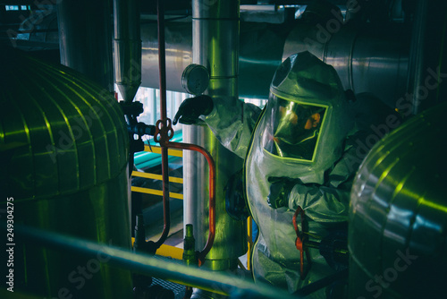 Man in a radiation protection suit. photo