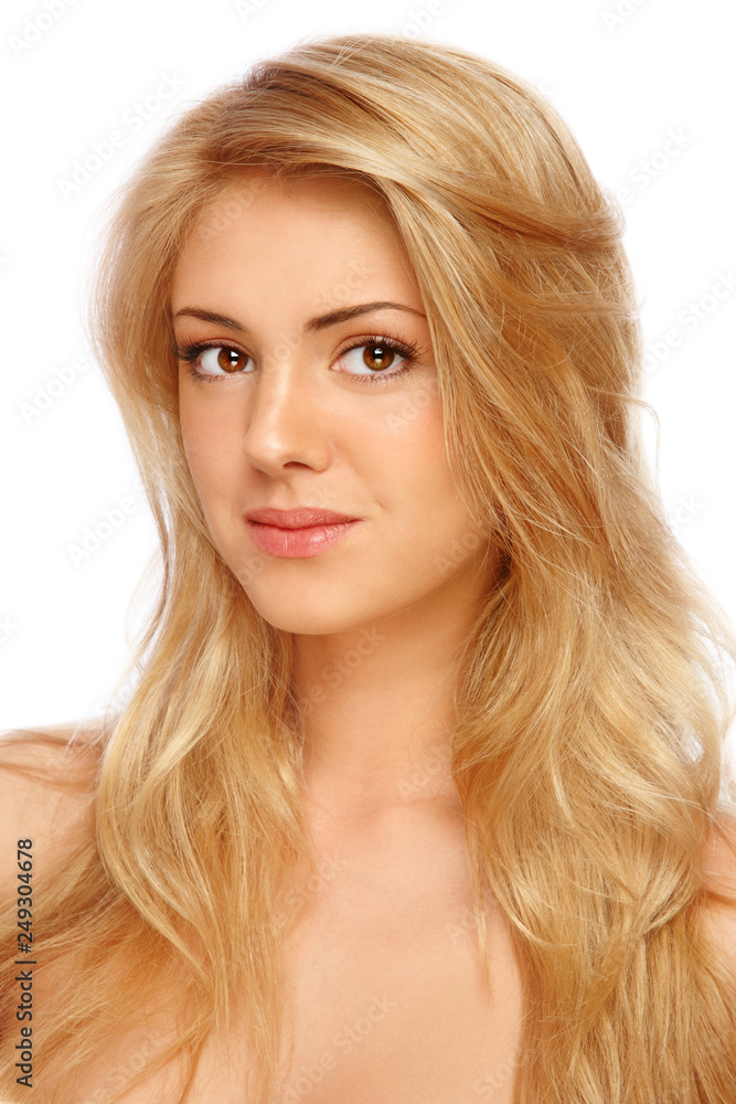 Young beautiful girl with long curly hair and clean make-up Young beautiful girl with long curly hair and clean make-up