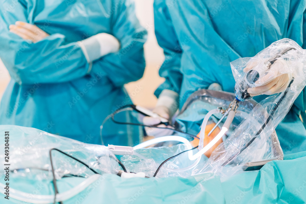 Team of surgeons operating in the hospital Team of surgeons operating in the hospital