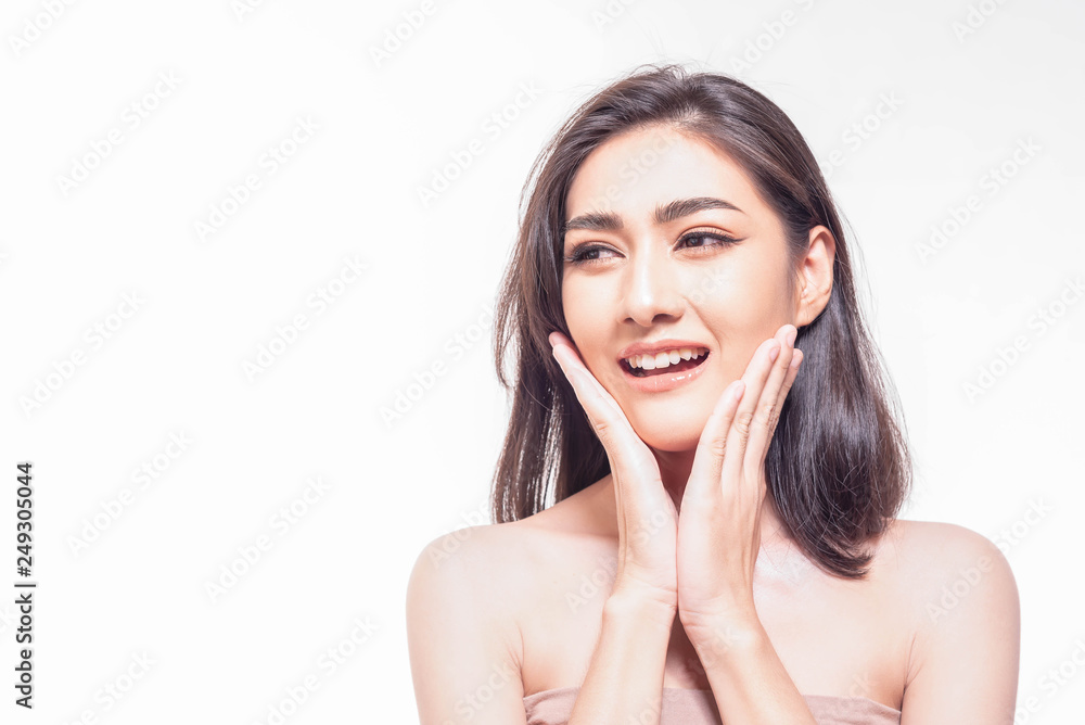 Beautiful young Asian woman with clear fresh skin touch her own face . Facial treatment, skin cleanser, cosmetology, beauty and spa conceptual. Beautiful young Asian woman with clear fresh skin touch her own face . Facial treatment, skin cleanser, cosmetology, beauty and spa conceptual.