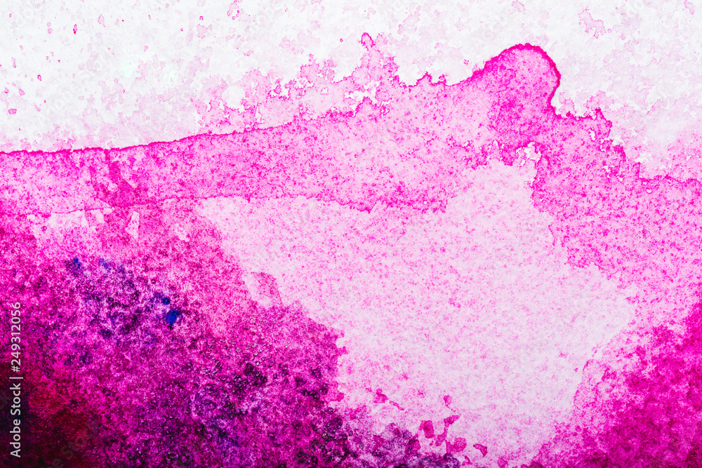 top view of pink watercolor spill on white background