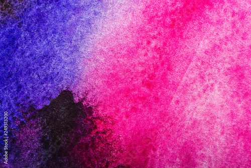 top view of pink and purple watercolor spills with copy space