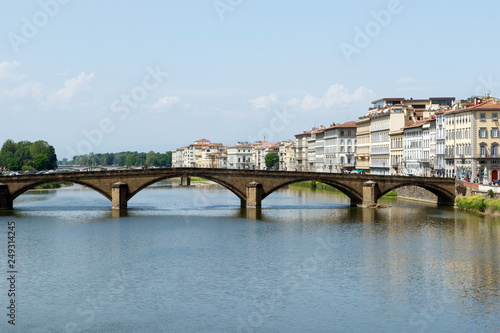 Bridge across the Arno River, Florence, Italy with palazzos lining the bank