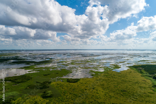 Aerial Shot of beautiful blue sky over lake in thale noi phatthalung Thailand